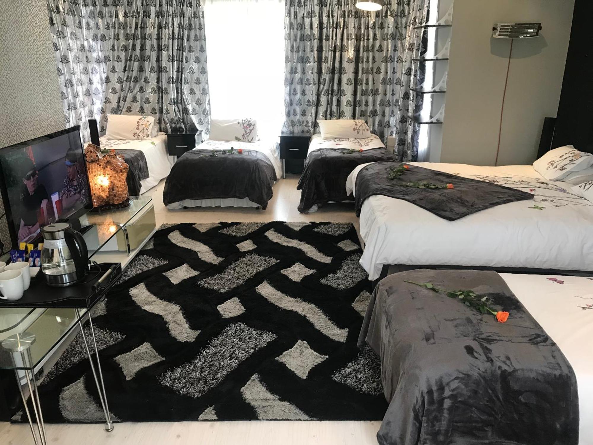 Africa Paradise - Or Tambo Airport Boutique Hotel Benoni Rom bilde