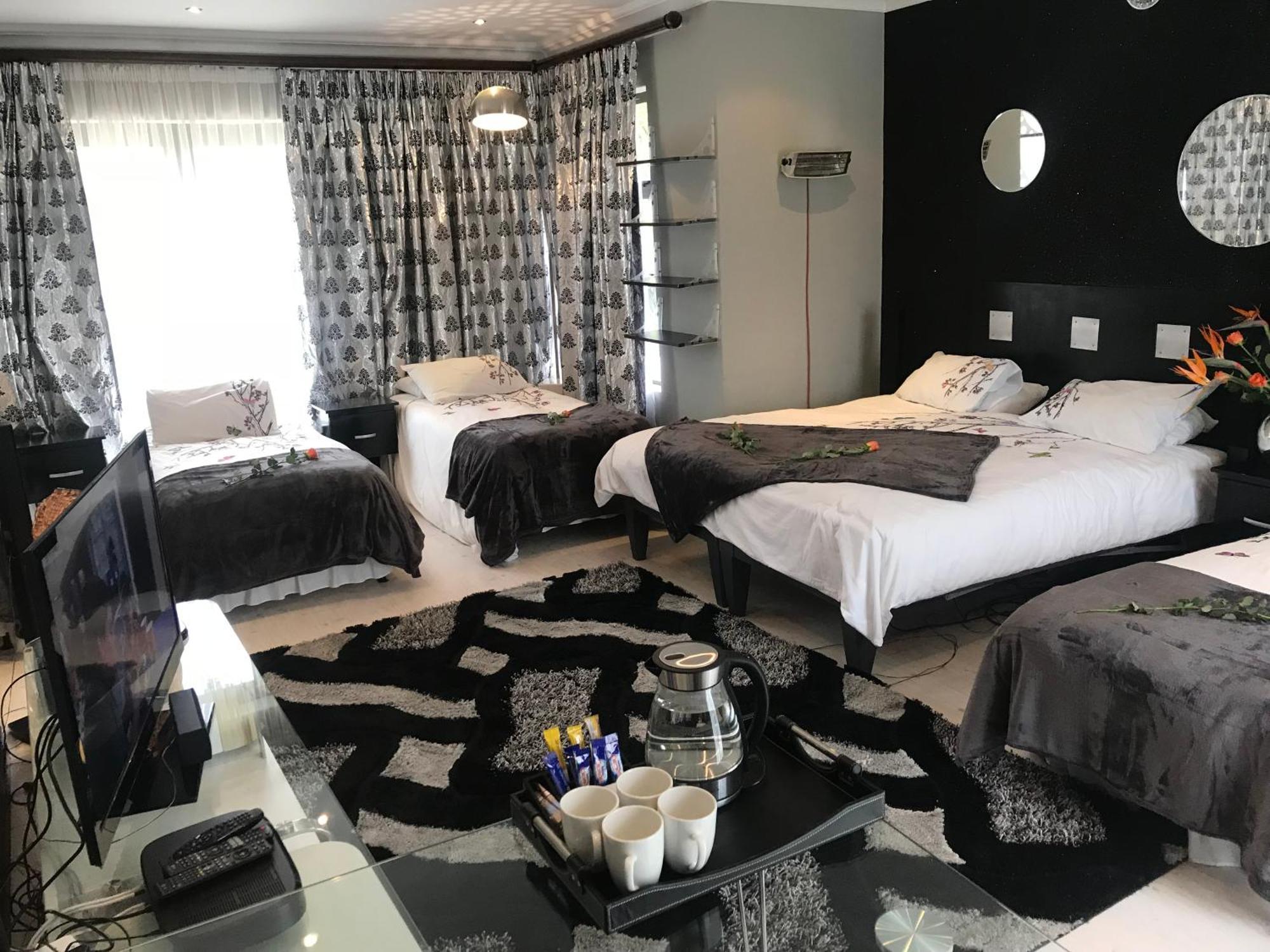 Africa Paradise - Or Tambo Airport Boutique Hotel Benoni Rom bilde
